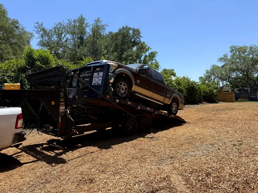 A pickup truck loaded onto an FRT gooseneck trailer
